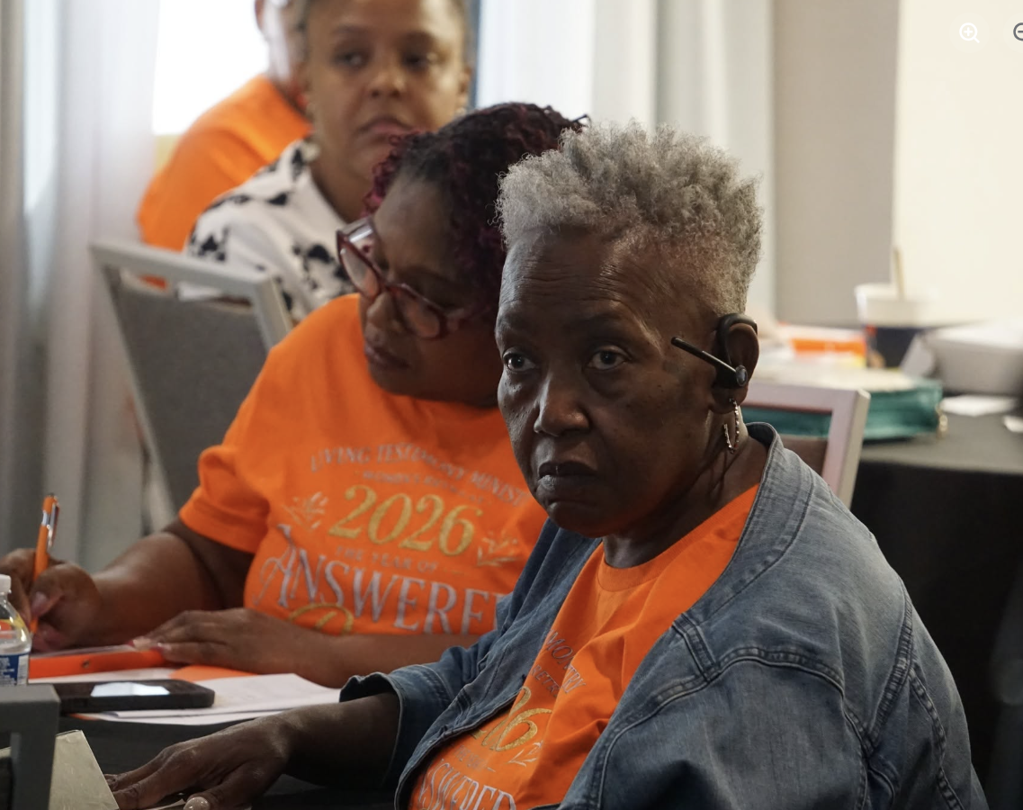 Women listening during a retreat teaching session